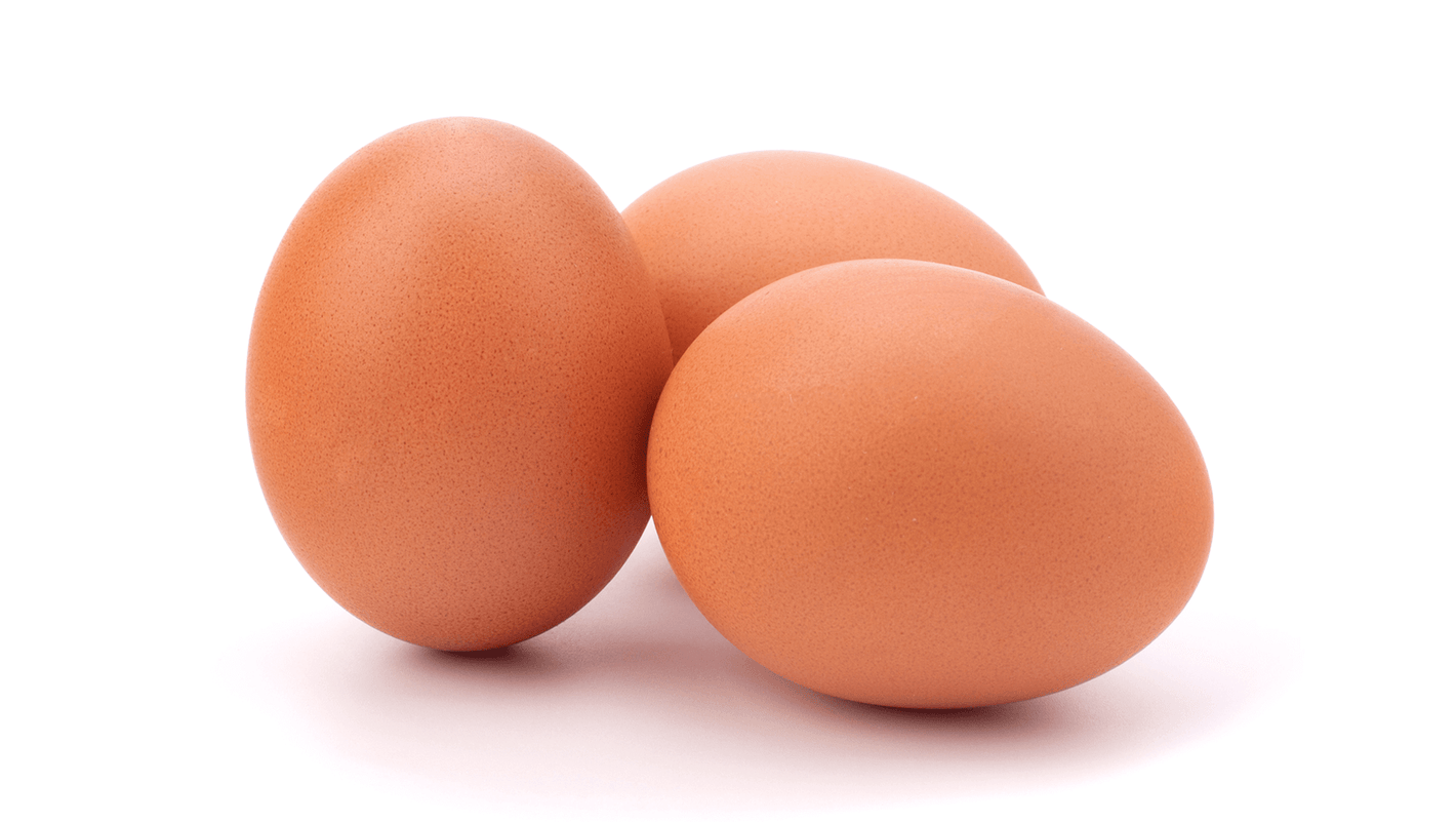 3 brown eggs on a white background